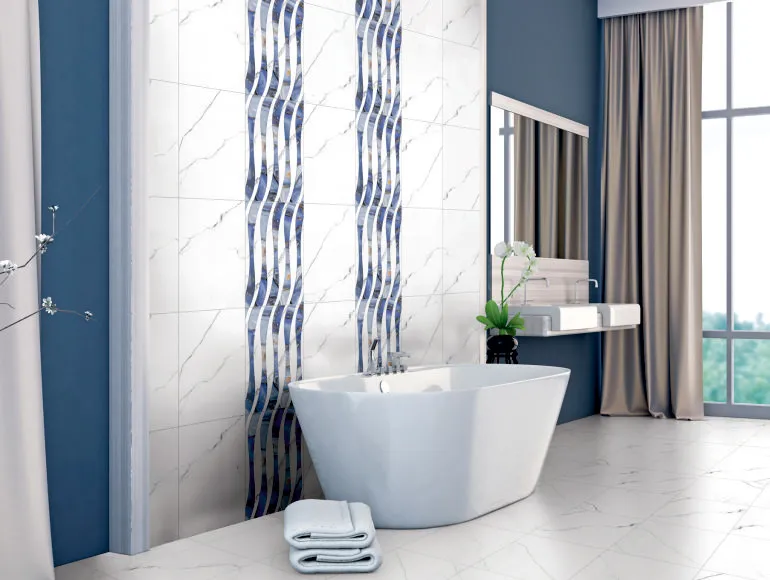 Blue bathroom design with bathtub, window and Statuario Bianco Wave ceramic wall tiles